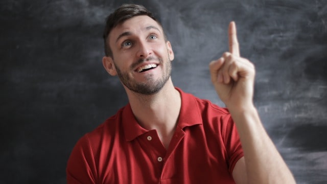 IELTS Speaking student thinking about communication ideas