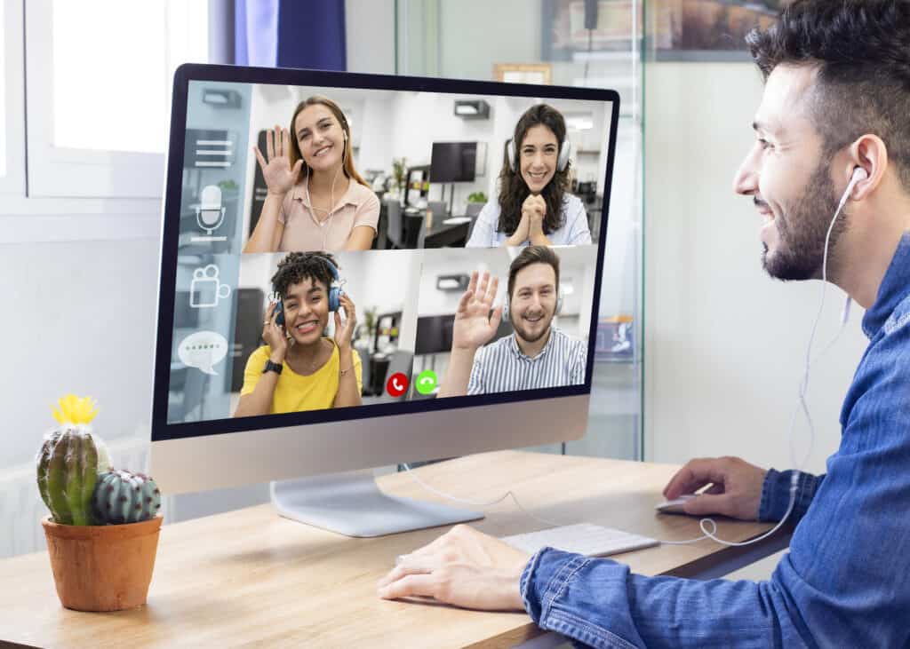 tudents communicating remotely via video conference can be seen on a laptop screen. Making video calls enjoy communication, virtual